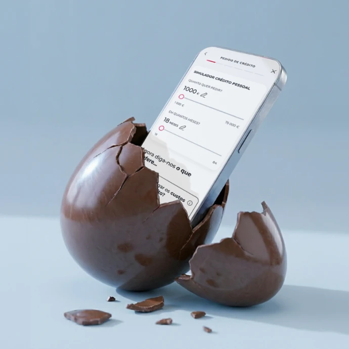 Image of a broken egg with a cell phone sticking out of it