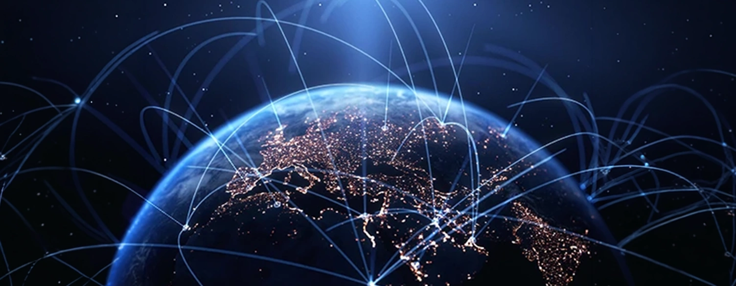 Planeta Terra visto do espaço com luzes e linhas a simbolizar uma rede global