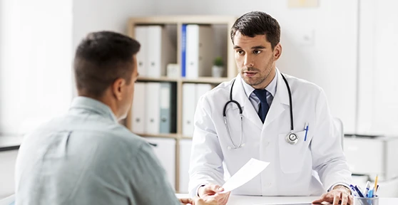 doctor talking to a patient in a medical office