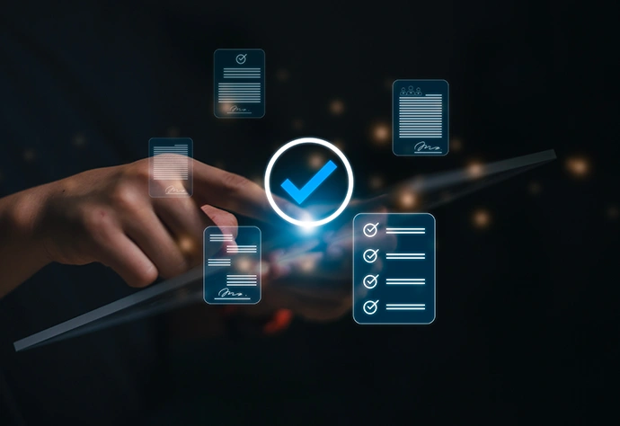 Finger touching a screen with a tick and digital document icons