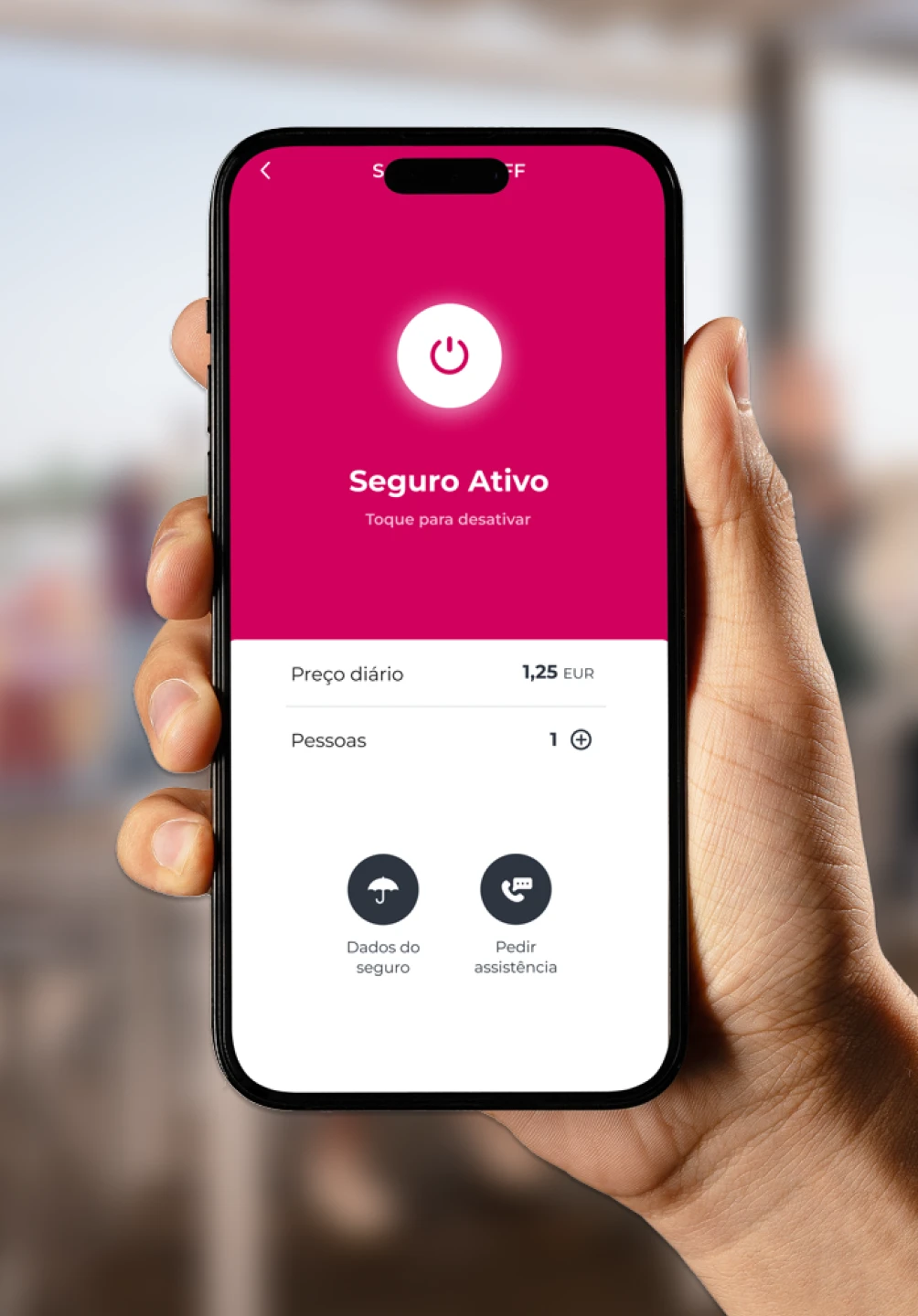 Mão a segurar um telemóvel