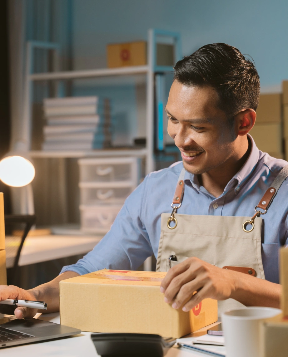 man preparing orders for shipment