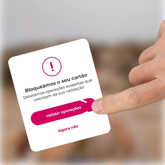 Dedo indicador a clicar no botão "Validar operações" na App Millennium