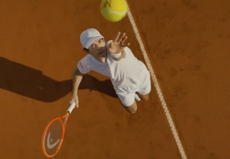 Nuno Borges hitting a serve