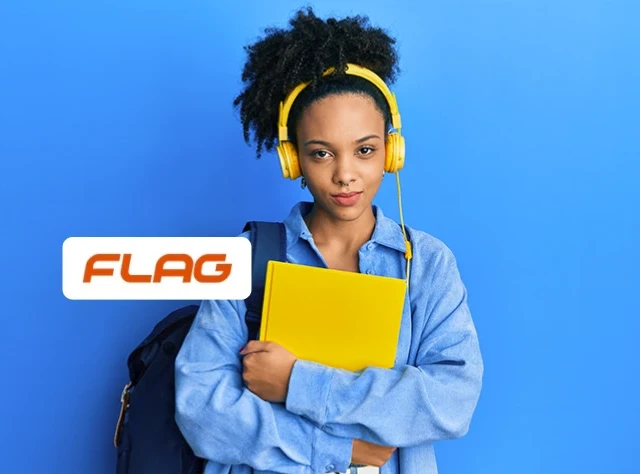  Smiling university student with headphones and notebooks in hand