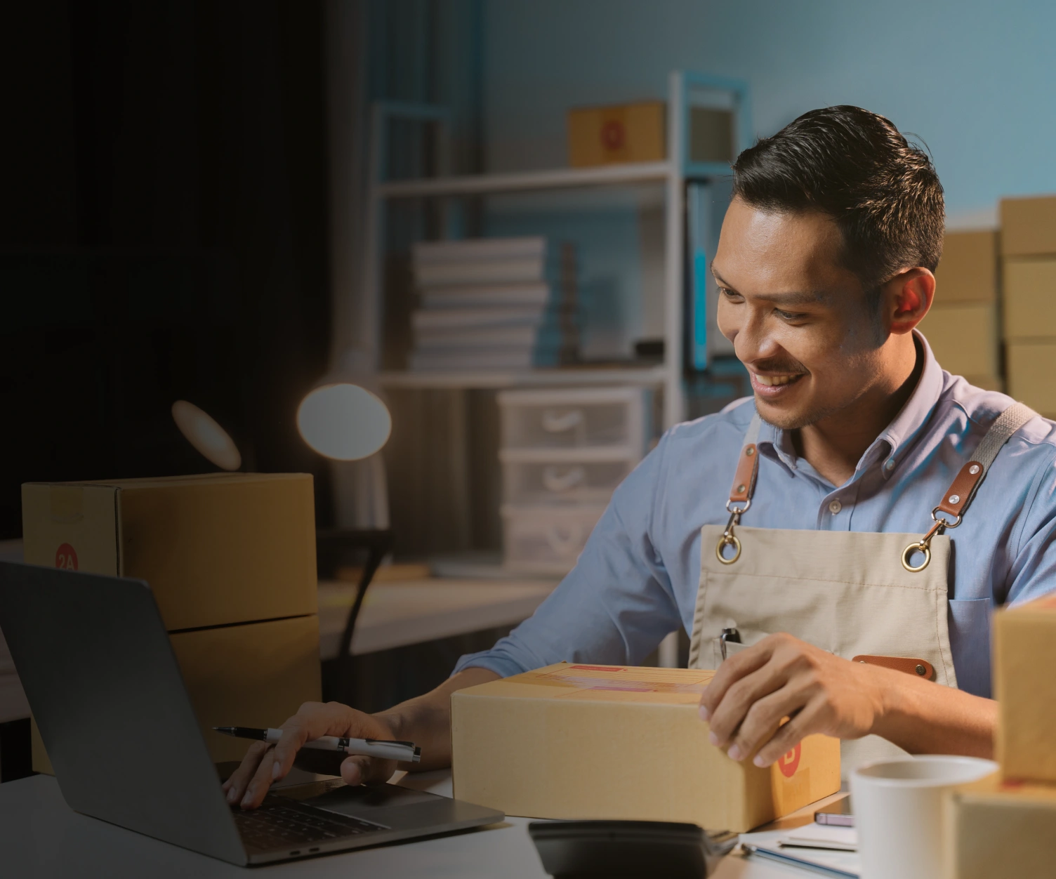 man preparing orders for shipment