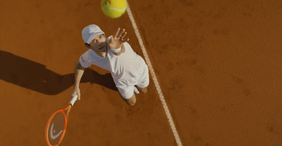 Nuno Borges hitting a serve