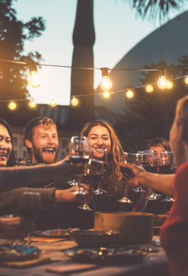 Friends toasting at a dinner